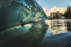 A large shore breaking wave at Pebbles Beach Barbados by Fine Art Photographer Andre Donawa