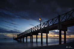 Fine art photograph of the jetty on Brownes Beach, Barbados, blue hour by Andre Donawa