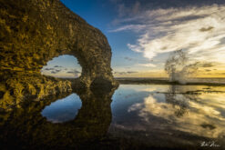 Fine art photograph of arch at Little Bay, Barbados by Andre Donawa, seacsape