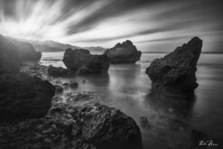 Fine art black and long exposure photograph of Bathsheba, Barbados by Andre Donawa