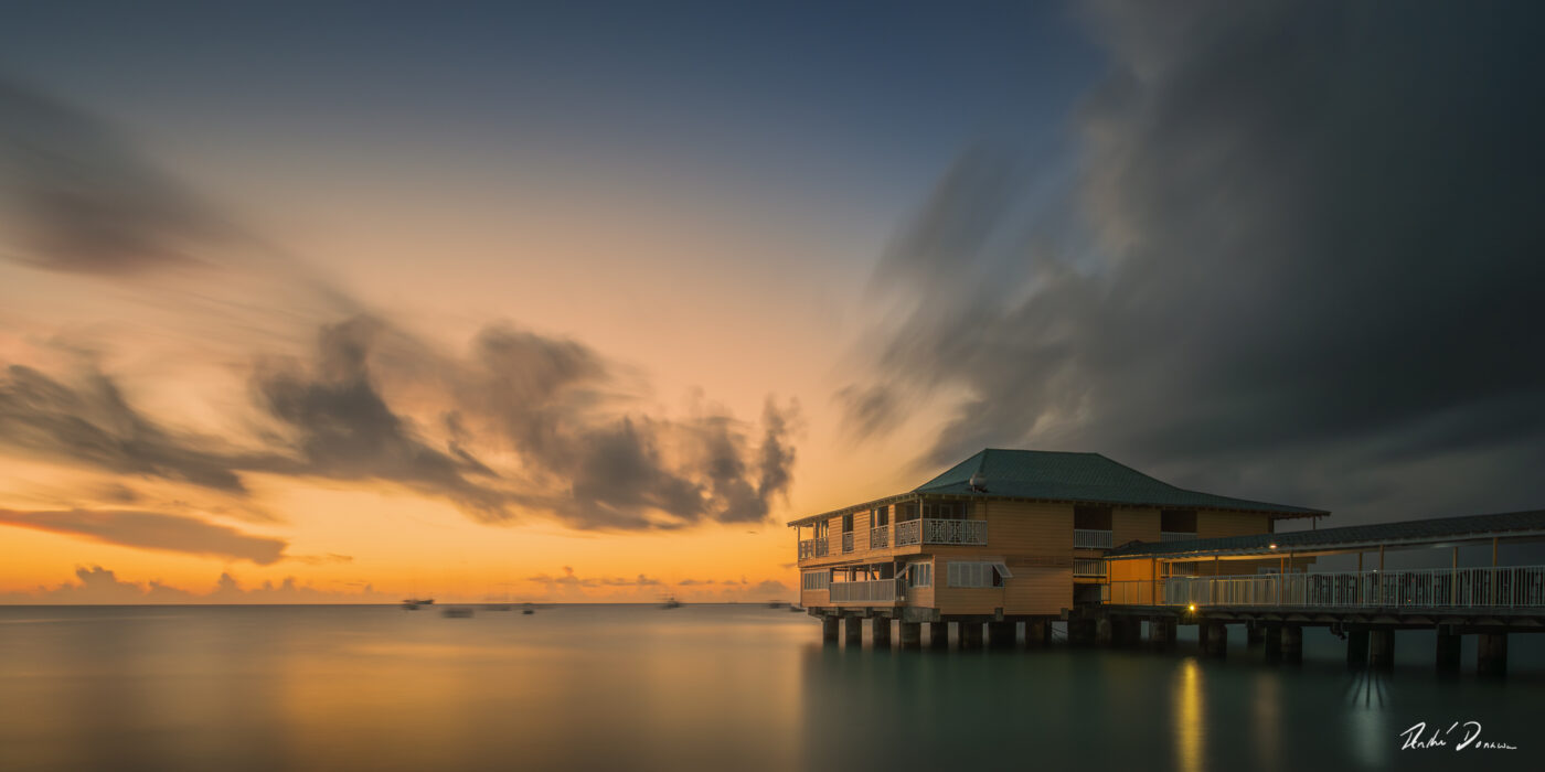 Fine art photograph of Aquatica jetty, Pebbles Beach, Barbados by Andre Donawa.