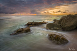 Fine art photograph of ancient canons in the sea Barbados by Andre Donawa.